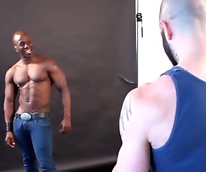 Black muscle stud riding white cock